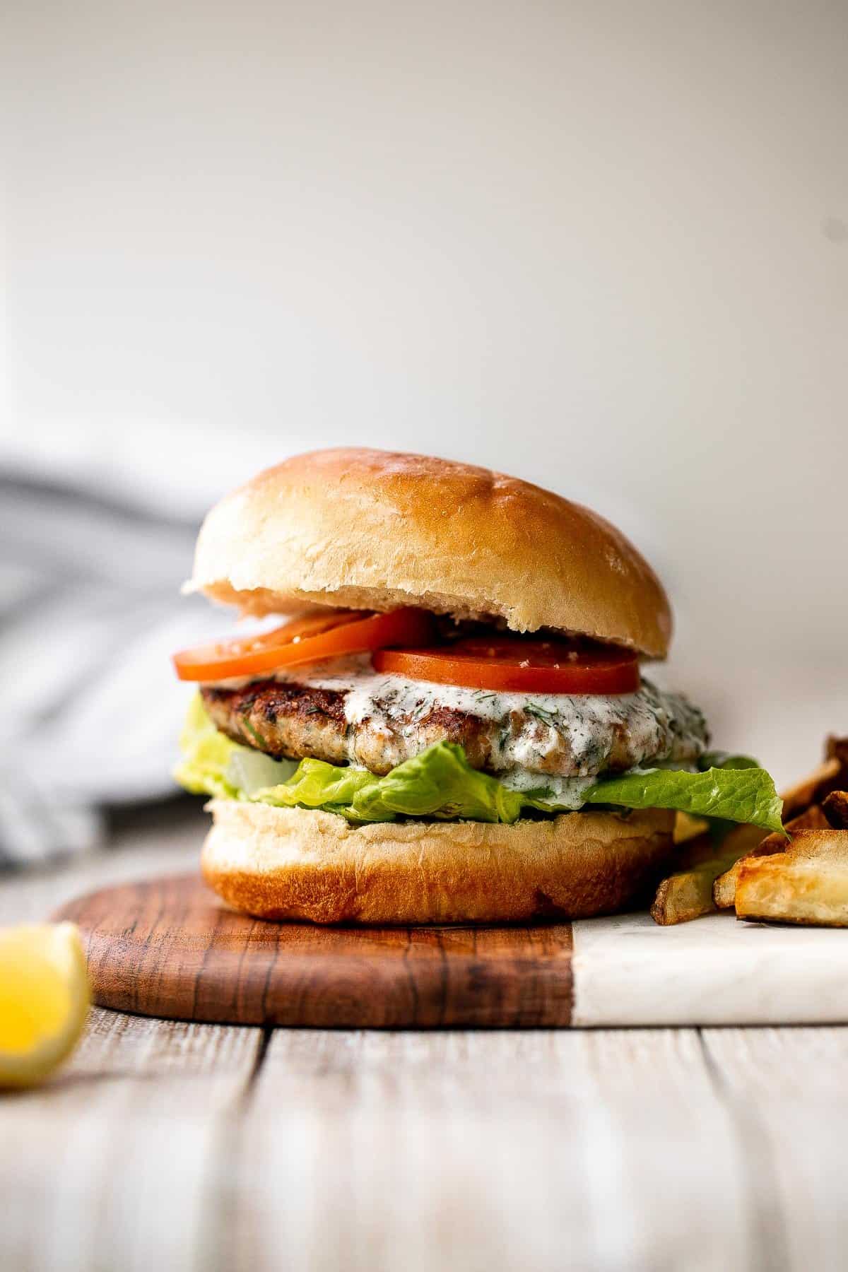 Mediterranean turkey burgers are tender, juicy, and delicious, loaded with garlic, fresh dill, and lemon juice. The perfect summer weeknight meal. | aheadofthyme.com