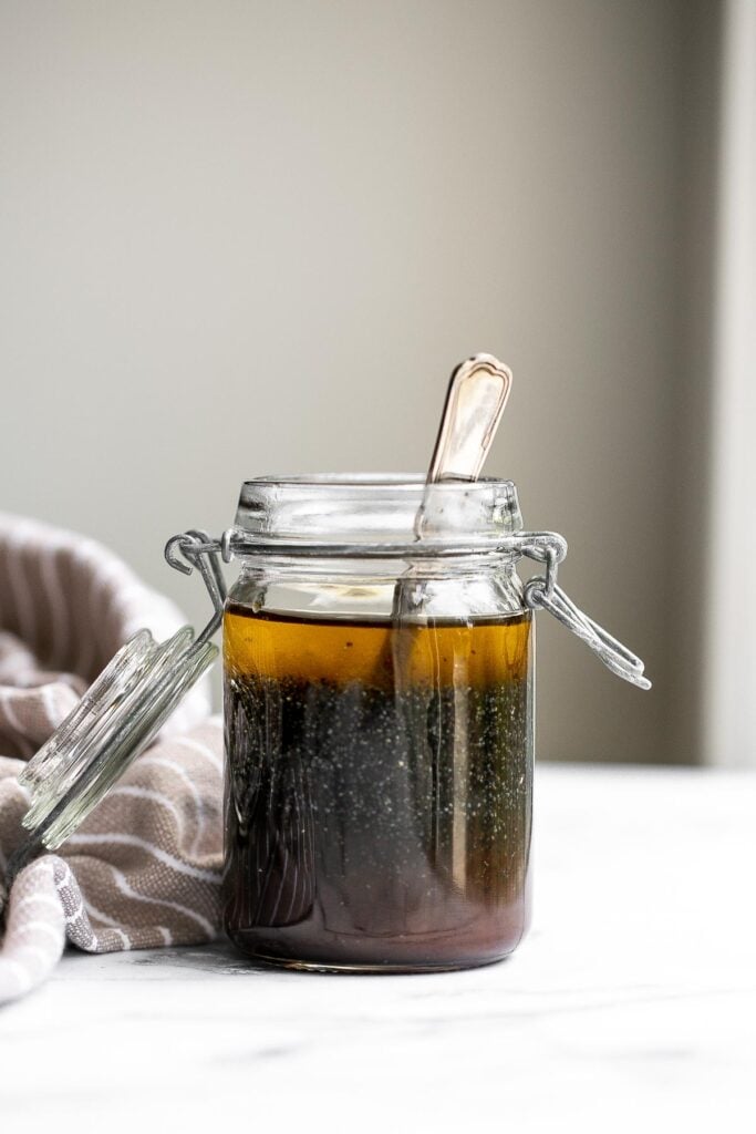 Homemade poppy seed dressing is sweet, savory, and fresh. It's a quick and easy olive oil and balsamic salad dressing that is loaded with poppy seeds. | aheadofthyme.com