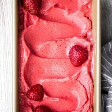 Homemade strawberry frozen yogurt is a delicious, refreshing, healthy dessert made with 4 simple ingredients, no refined sugar, and in less than 5 minutes. | aheadofthyme.com