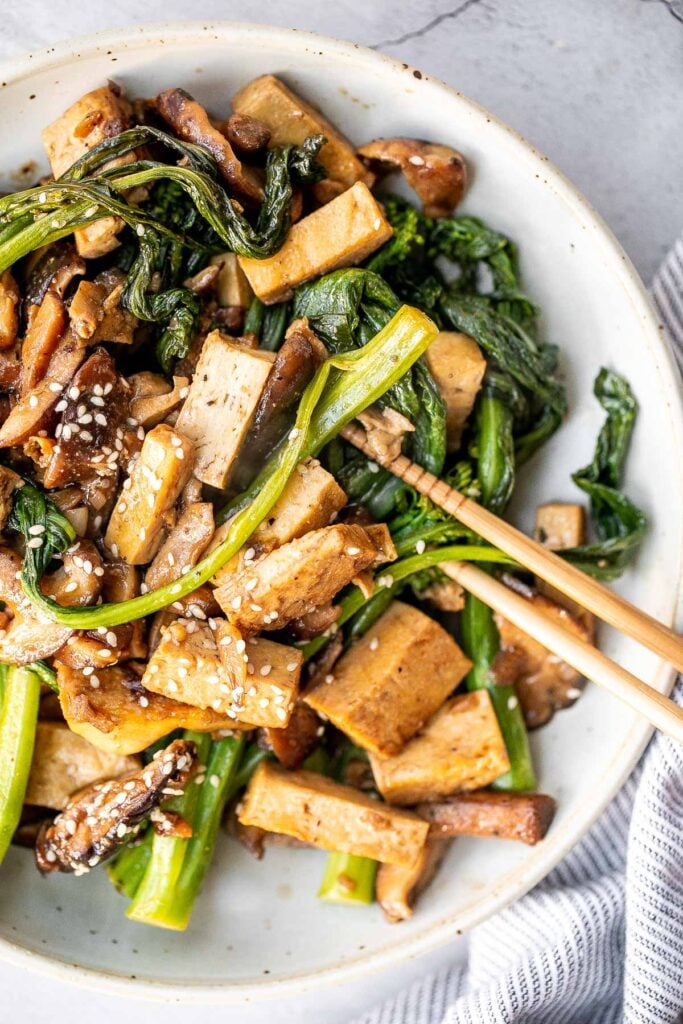 Quick, easy, and simple, vegan tofu and mushroom stir fry is a delicious meal that is ready in under 15 minutes. Serve it over a bowl of steamed rice. | aheadofthyme.com