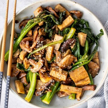 Quick, easy, and simple, vegan tofu and mushroom stir fry is a delicious meal that is ready in under 15 minutes. Serve it over a bowl of steamed rice. | aheadofthyme.com