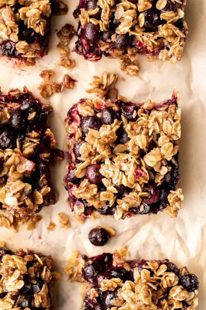 Blueberry oat squares are sweet, buttery, and delicious, with three mouthwatering layers. With just 15 minutes of prep, they are the perfect treat. | aheadofthyme.com