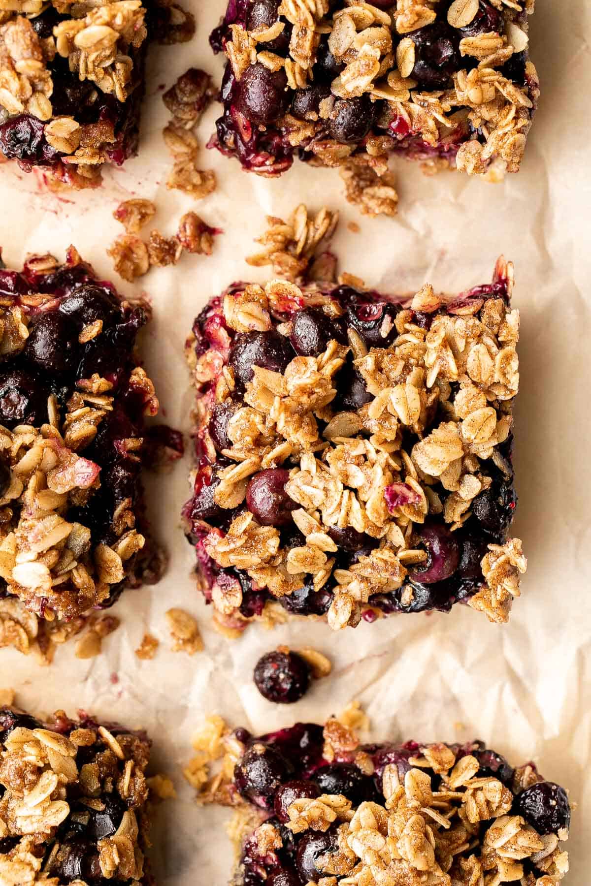Blueberry oat squares are sweet, buttery, and delicious, with three mouthwatering layers. With just 15 minutes of prep, they are the perfect treat. | aheadofthyme.com