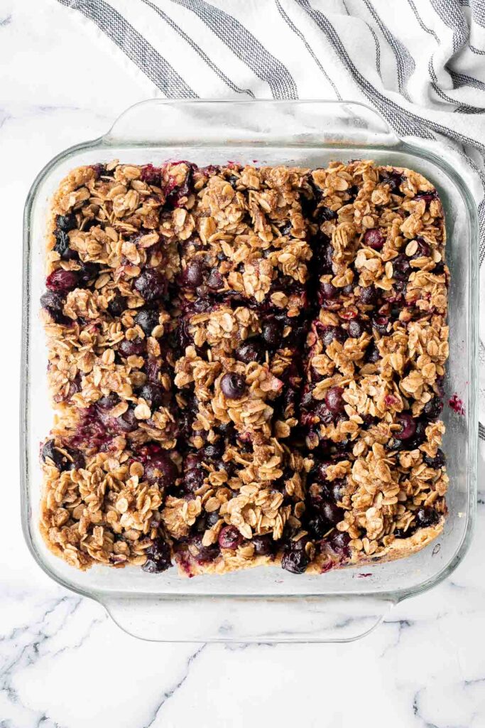 Blueberry oat squares are sweet, buttery, and delicious, with three mouthwatering layers. With just 15 minutes of prep, they are the perfect treat. | aheadofthyme.com
