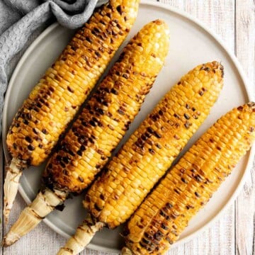 Buttery and salty grilled corn on the cob with beautiful char marks, delicious flavor, and the best texture is the easiest recipe to throw on the grill. | aheadofthyme.com