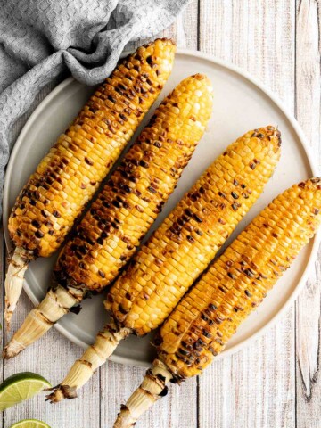 Buttery and salty grilled corn on the cob with beautiful char marks, delicious flavor, and the best texture is the easiest recipe to throw on the grill. | aheadofthyme.com