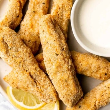 Quick easy baked homemade fish sticks are crispy on the outside, tender and flaky on the inside, and packed with flavor. Kid-friendly + freezer-friendly. | aheadofthyme.com