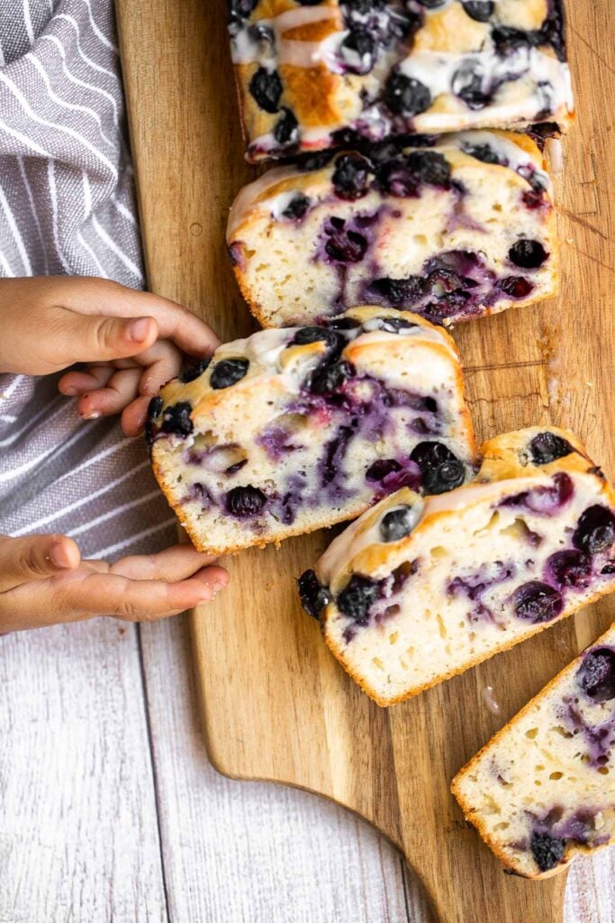 Easy lemon blueberry bread with lemon glaze is soft, moist, and delicious. This quick bread with fresh blueberries and lemon is the perfect summer dessert. | aheadofthyme.com