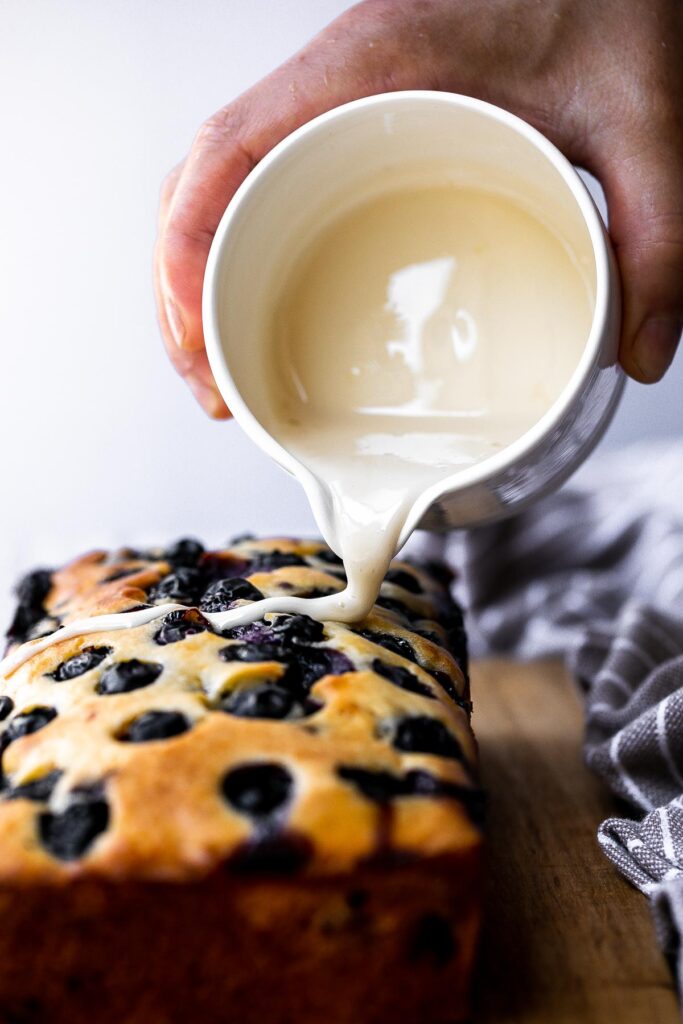 Easy lemon blueberry bread with lemon glaze is soft, moist, and delicious. This quick bread with fresh blueberries and lemon is the perfect summer dessert. | aheadofthyme.com