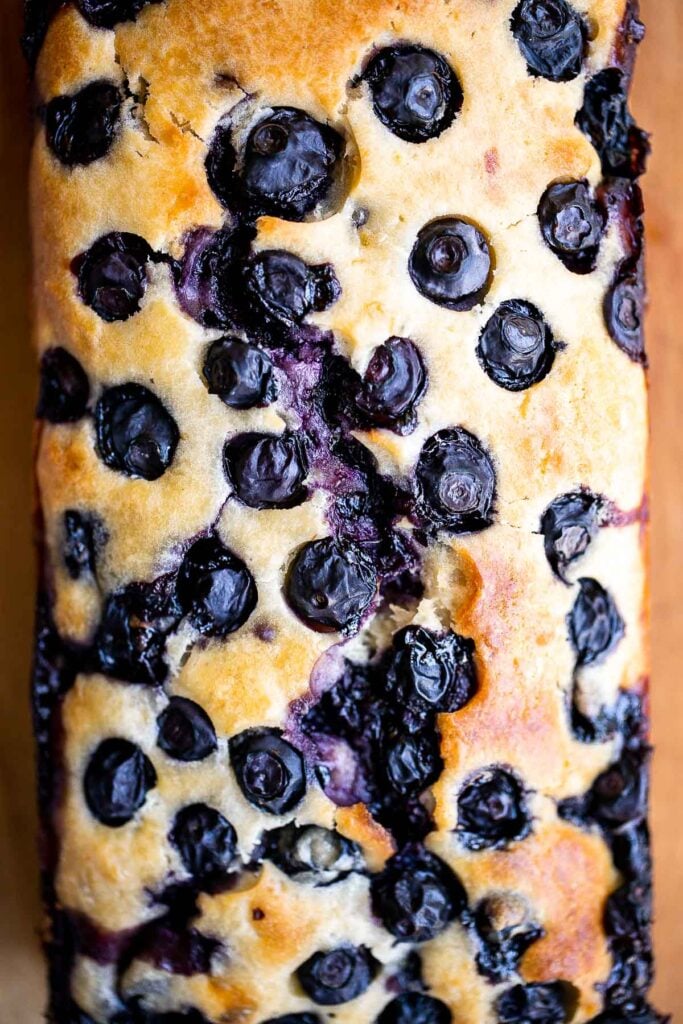 Easy lemon blueberry bread with lemon glaze is soft, moist, and delicious. This quick bread with fresh blueberries and lemon is the perfect summer dessert. | aheadofthyme.com