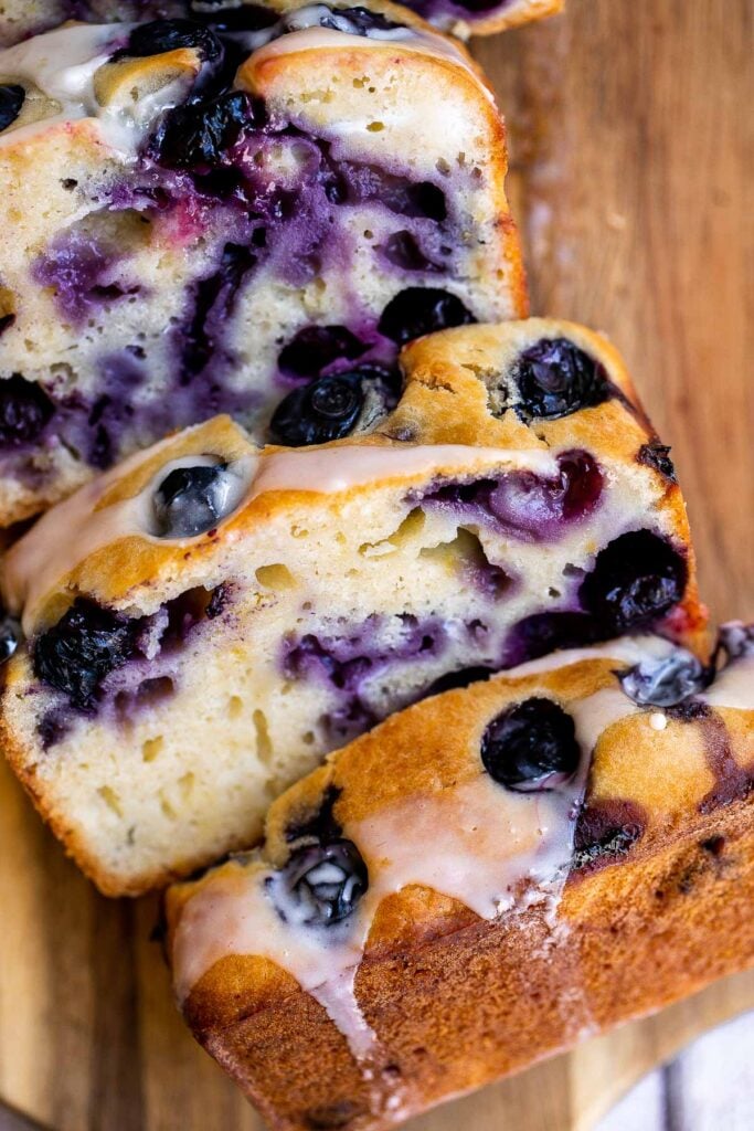 Easy lemon blueberry bread with lemon glaze is soft, moist, and delicious. This quick bread with fresh blueberries and lemon is the perfect summer dessert. | aheadofthyme.com