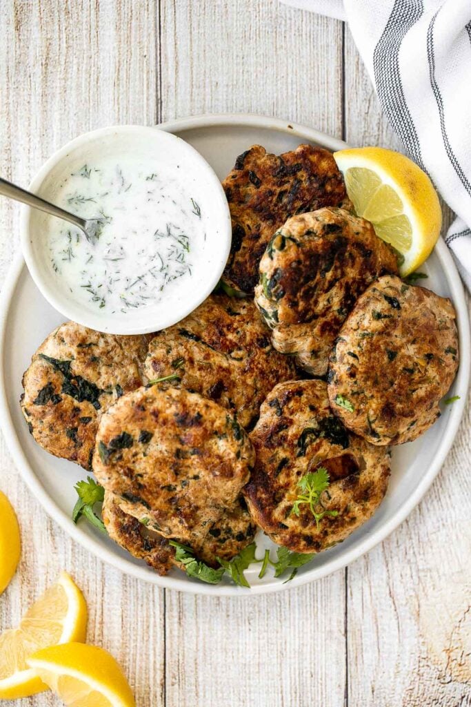 Delicious, moist and juicy Mediterranean chicken patties have everything you want in one bite: protein, veggies, herbs, and they're quick and easy to make. | aheadofthyme.com