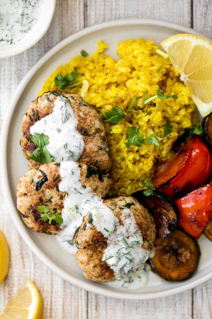 Delicious, moist and juicy Mediterranean chicken patties have everything you want in one bite: protein, veggies, herbs, and they're quick and easy to make. | aheadofthyme.com