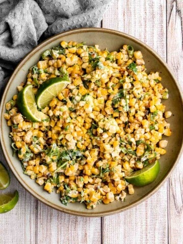 Mexican street corn salad adds a twist to a classic street food, loaded with freshly grilled corn, a creamy cheesy dressing, and authentic flavor. | aheadofthyme.com