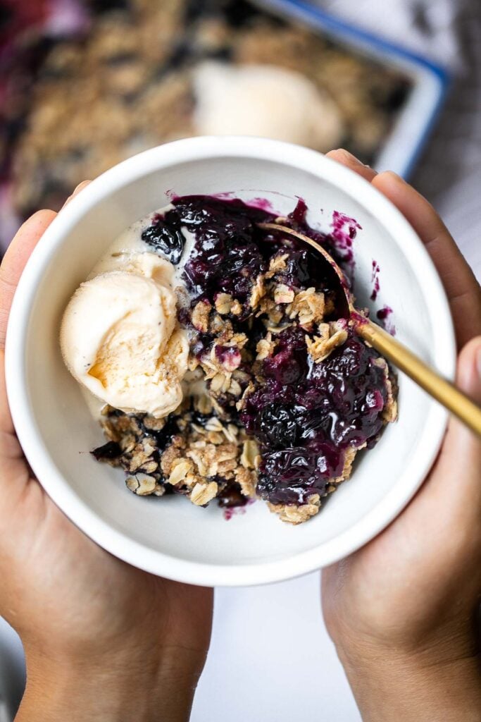 Blueberry crisp with a sweet blueberry filling and a buttery, crispy oat topping, is a delicious, fruity treat that's ready in just 45 minutes. | aheadofthyme.com