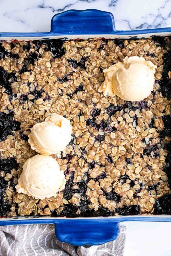 Blueberry crisp with a sweet blueberry filling and a buttery, crispy oat topping, is a delicious, fruity treat that's ready in just 45 minutes. | aheadofthyme.com