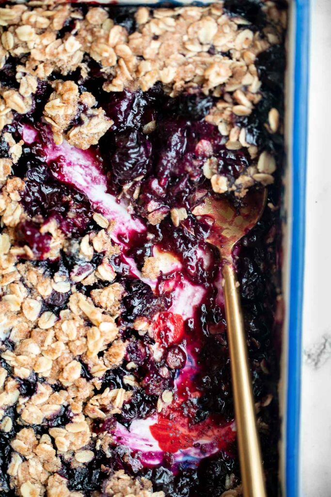 Blueberry crisp with a sweet blueberry filling and a buttery, crispy oat topping, is a delicious, fruity treat that's ready in just 45 minutes. | aheadofthyme.com