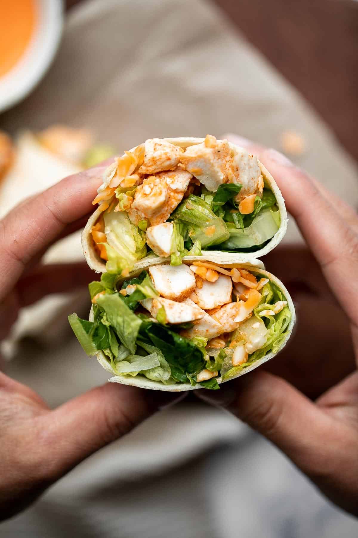 Quick easy buffalo turkey wraps with homemade buffalo sauce are flavorful, spicy, and delicious. A healthy lunch that will keep you full until dinner. | aheadofthyme.com