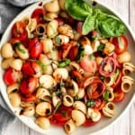 Bright and colorful caprese pasta salad is the ultimate summer side dish. It's fresh, light, and loaded with vibrant summer flavors. Quick and easy too! | aheadofthyme.com