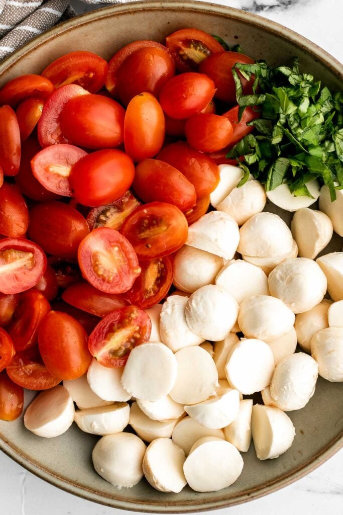 Bright and colorful caprese pasta salad is the ultimate summer side dish. It's fresh, light, and loaded with vibrant summer flavors. Quick and easy too! | aheadofthyme.com