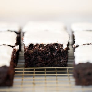 Chocolate zucchini cake is moist, fluffy, and delicious. Loaded with fresh zucchini for a burst of nutrition, and topped with a homemade cream cheese icing. | aheadofthyme.com