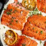 Creamy garlic salmon is a quick easy one-pan meal ready in under 30 minutes, with seared flaky tender salmon tossed in a delicious creamy garlic sauce. | aheadofthyme.com