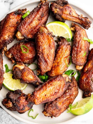 Jamaican jerk chicken wings with delicious crispy skin and tender and juicy meat are loaded with flavor. They're easy to make on the oven, grill, air fryer. | aheadofthyme.com