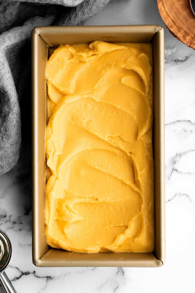 Mango frozen yogurt is a healthy, creamy, fruity, and refreshing frozen treat that's easy to make in minutes with a few ingredients and no refined sugar. | aheadofthyme.com