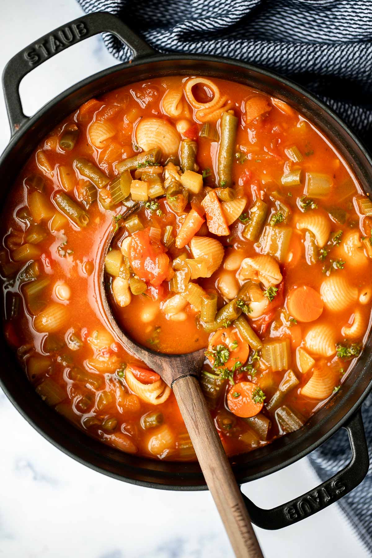 Minestrone soup is a hearty, healthy, nourishing, and delicious classic Italian soup, packed with vegetables and pasta simmered in a rich tomato broth. | aheadofthyme.com