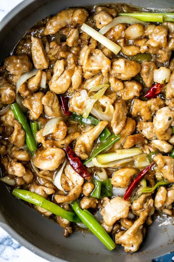 Mongolian chicken is a quick and easy chicken stir fry dish that you can make at home in just 30 minutes. Healthier, faster, and better than takeout. | aheadofthyme.com