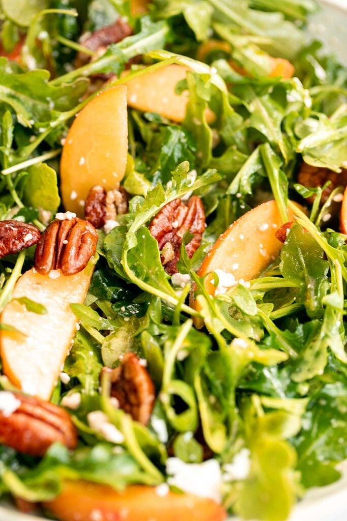 Peach arugula salad with balsamic vinaigrette is an easy delicious summer salad made with a handful of simple ingredients that packs on lots of flavor. | aheadofthyme.com