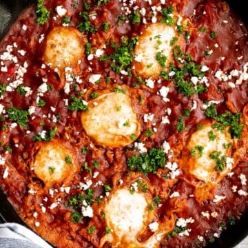 Shakshuka is a quick and easy, one-pan Middle Eastern classic with a savory saucy tomato-vegetable base and perfectly poached eggs on top. | aheadofthyme.com