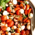 Quick and easy tomato and mozzarella caprese salad is a fresh, light, and delicious summer salad, made with just a few simple ingredients in 10 minutes. | aheadofthyme.com