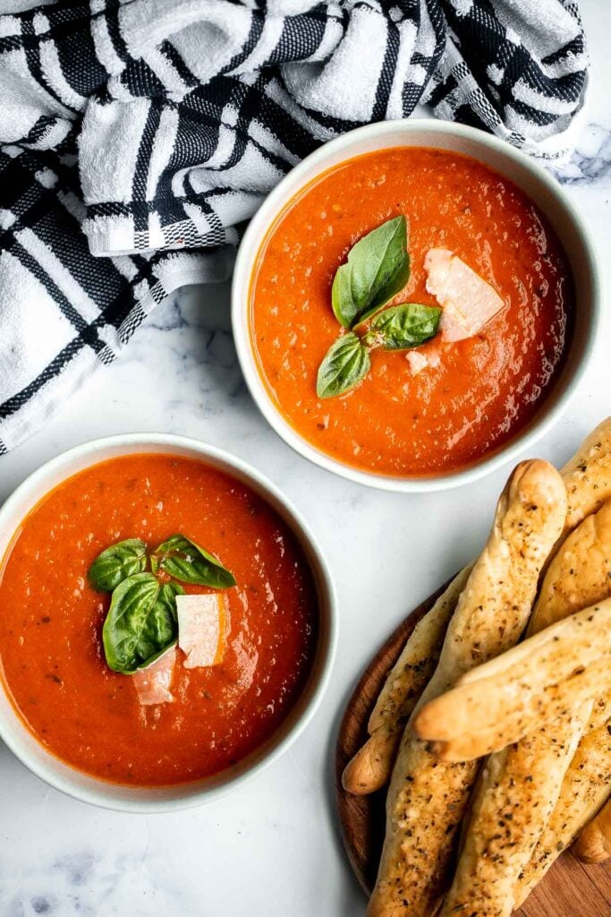 Homemade tomato basil soup is comforting, rich, and smooth. This cozy soup is easy, flavourful, and nourishing, making it so much better than canned. | aheadofthyme.com