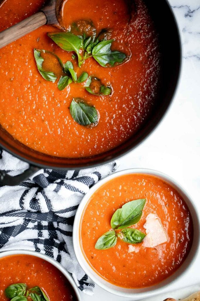 Homemade tomato basil soup is comforting, rich, and smooth. This cozy soup is easy, flavourful, and nourishing, making it so much better than canned. | aheadofthyme.com