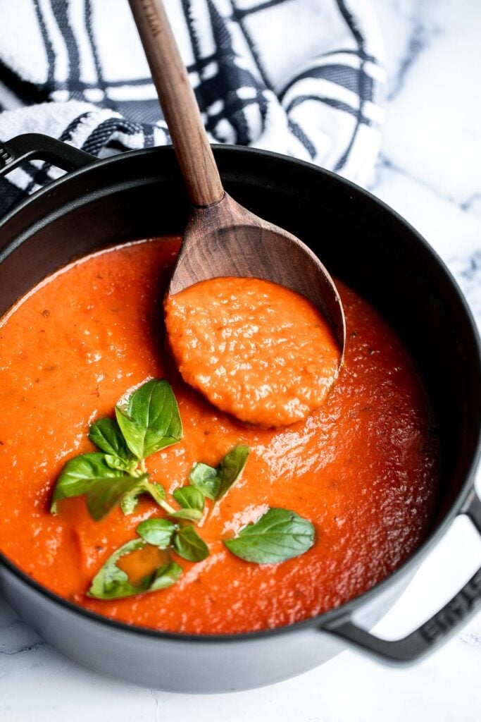 Homemade tomato basil soup is comforting, rich, and smooth. This cozy soup is easy, flavourful, and nourishing, making it so much better than canned. | aheadofthyme.com