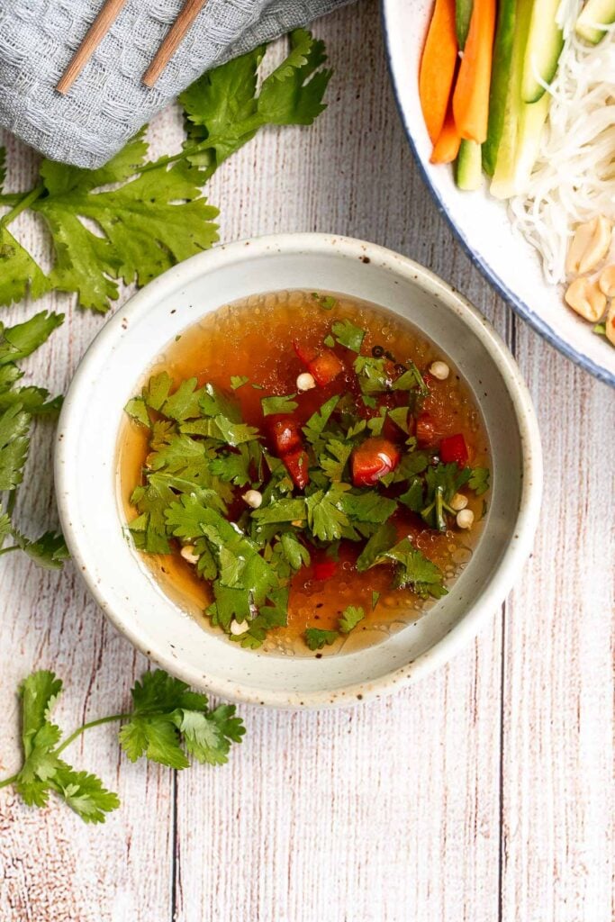 Vietnamese noodle bowl with lemongrass chicken, fresh vegetables and herbs, tossed in a homemade Vietnamese sauce is healthy, delicious, light, and filling. | aheadofthyme.com