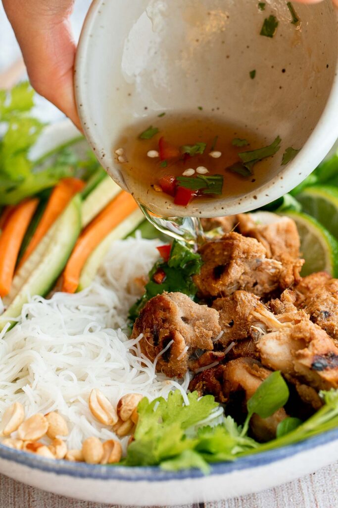 Vietnamese noodle bowl with lemongrass chicken, fresh vegetables and herbs, tossed in a homemade Vietnamese sauce is healthy, delicious, light, and filling. | aheadofthyme.com