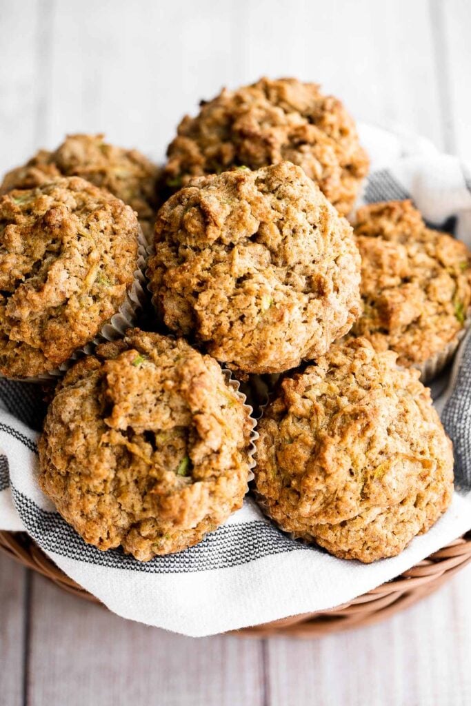 Quick and easy zucchini muffins are loaded with fresh zucchini which makes them fluffy, moist, delicious, and full of nutrients. Freezer-friendly too! | aheadofthyme.com