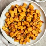 Air fryer butternut squash is a healthy side dish that is crispy on the outside and soft inside. It's faster than roasting in the oven and needs less oil. | aheadofthyme.com