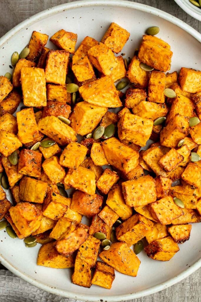 Air fryer butternut squash is a healthy side dish that is crispy on the outside and soft inside. It's faster than roasting in the oven and needs less oil. | aheadofthyme.com