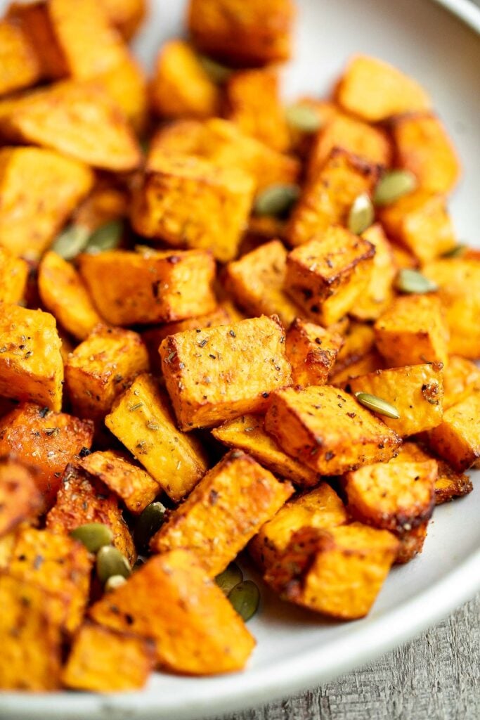 Air fryer butternut squash is a healthy side dish that is crispy on the outside and soft inside. It's faster than roasting in the oven and needs less oil. | aheadofthyme.com