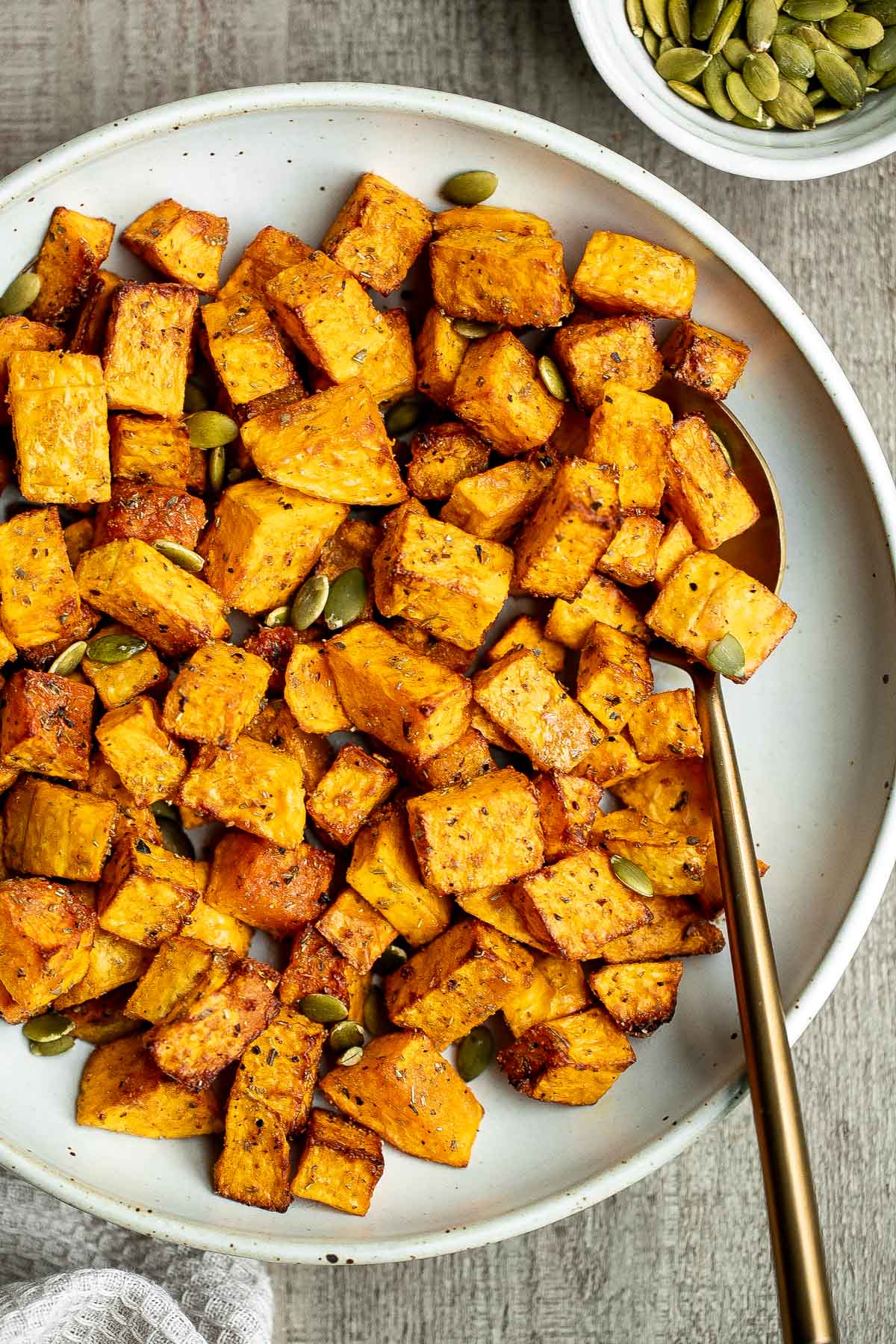 Air fryer butternut squash is a healthy side dish that is crispy on the outside and soft inside. It's faster than roasting in the oven and needs less oil. | aheadofthyme.com