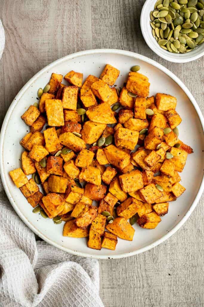 Air fryer butternut squash is a healthy side dish that is crispy on the outside and soft inside. It's faster than roasting in the oven and needs less oil. | aheadofthyme.com