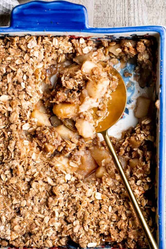 Apple crisp with tender cinnamon-sugar apples and crispy oat topping is sweet, tart, and just as delicious as an apple pie but takes a lot less effort. | aheadofthyme.com