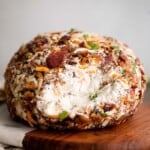 Bacon cheddar cheese ball is an easy to make appetizer and delicious showstopper at holiday parties or game day. It's creamy, cheesy, and nutty. | aheadofthyme.com