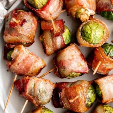 Bacon wrapped brussels sprouts are the sweet, savory, and salty appetizer that you need at your next holiday gathering this fall. Simple and easy to make. | aheadofthyme.com