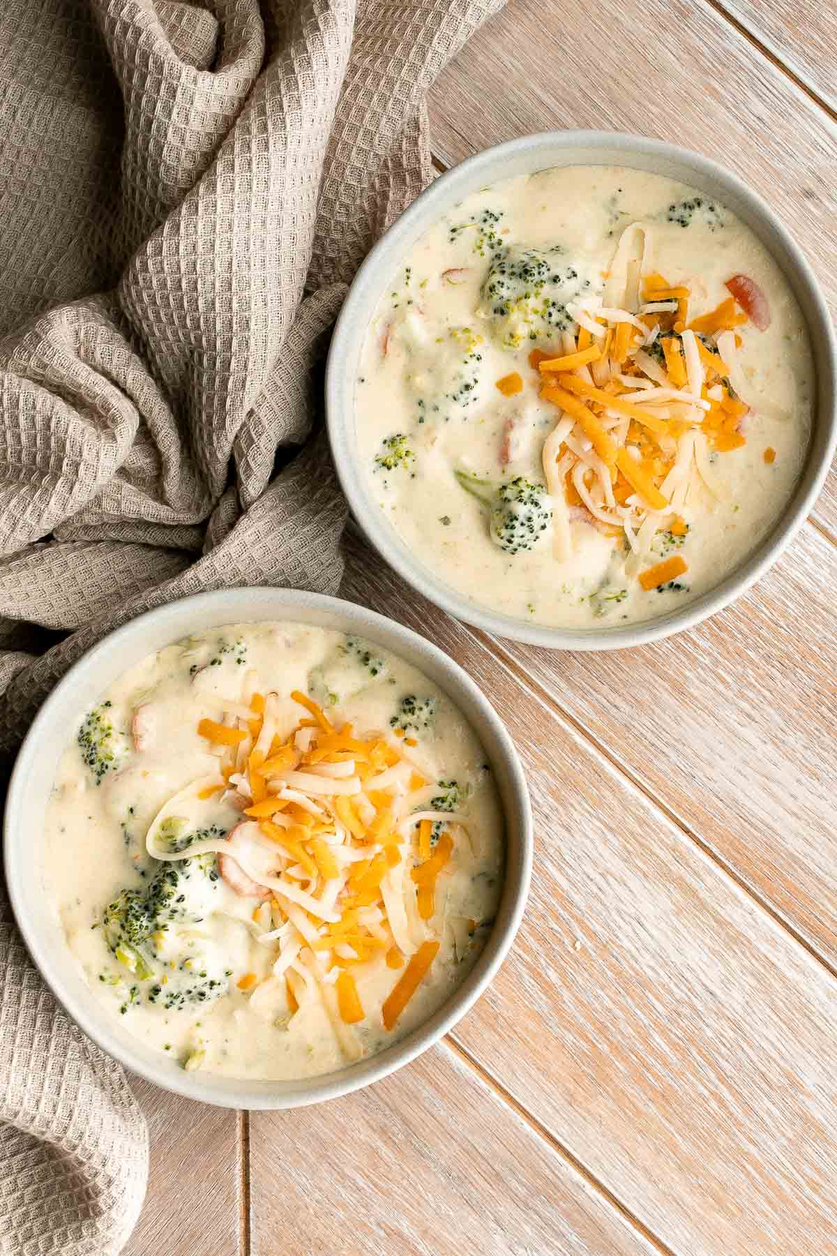 Broccoli cheese soup is creamy, cozy, and delicious simmered in a buttery cheesy broth for the perfect blend of textures and flavors — comfort food goals. | aheadofthyme.com