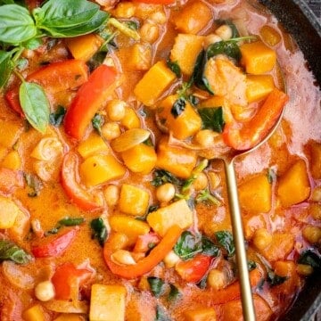 Butternut squash curry with chickpeas is a rich hearty one pot meal that will satisfy your fall comfort food cravings. Great for weeknight family dinners. | aheadofthyme.com