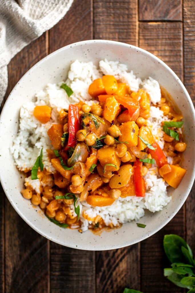 Butternut squash curry with chickpeas is a rich hearty one pot meal that will satisfy your fall comfort food cravings. Great for weeknight family dinners. | aheadofthyme.com